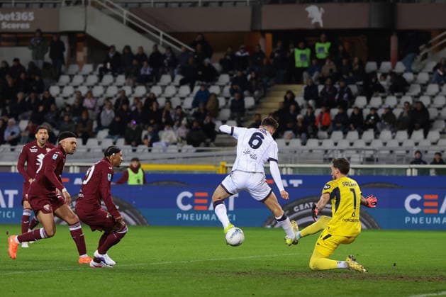 Turin, Italy, 15th February 2026. Nikola Moro of Bologna FC scores to give the side a 1-0 lead during the Torino vs Bologna Serie A match at Stadio Grande Torino, Turin. Picture credit should read: Jonathan Moscrop Sportimage EDITORIAL USE ONLY. No use with unauthorised audio, video, data, fixture lists, club league logos or live services. Online in-match use limited to 120 images, no video emulation. No use in betting, games or single club league player publications. SPI_055_TORO_BOLOGNA SPI-4525-0055