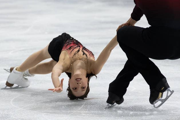 February 15, 2026, Milano, Lombardy, Italy: Riku Miura of Japan and Ryuichi Kihara of Japan currently in 5th place perform in Ice Skating Pairs Short Program during the 2026 Winter Olympics at the Milano Ice Skating Arena on Sunday in Milano. Olympics 2026: Milano Cortina: Figure skating, Eiskunstlauf Pairs  - ZUMAj89_ 20260215_oly_j89_080 Copyright: xPaulxKitagakixJr.x