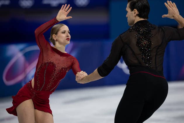 February 15, 2026, Milano, Lombardy, Italy: Minerva Fabienne Hase of Germany and Nikita Volodin of Germany currently in 1st place perform in Ice Skating Pairs Short Program during the 2026 Winter Olympics at the Milano Ice Skating Arena on Sunday in Milano. Olympics 2026: Milano Cortina: Figure skating, Eiskunstlauf Pairs  - ZUMAj89_ 20260215_oly_j89_077 Copyright: xPaulxKitagakixJr.x