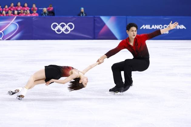 Milan Cortina Olympics: Figure skating, Eiskunstlauf Riku Miura (L) and Ryuichi Kihara of Japan perform in the pairs figure skating short program at the Milan Cortina Olympics at Milano Ice Skating Arena in Milan on Feb. 15, 2026.  A14AA0005291171P