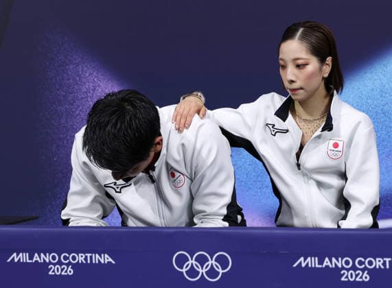 (260216) -- MILAN, Feb. 16, 2026 -- Miura Riku and Kihara Ryuichi of Japan react after their performance during the Figure skating, Eiskunstlauf pair skating short program match at the Milan-Cortina 2026 Olympic Winter games, Winterspiele,Spiele, Summer games in Milan, Italy, Feb. 15, 2026. ) (MICO2026)ITALY-MILAN-OLYMPIC WINTER GAMES-FIGURE SKATING-PAIR SKATING-SHORT PROGRAM ChenxYichen 