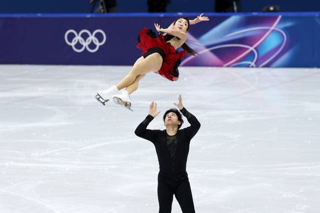 MILAN, ITALY - FEBRUARY 15: Sui Wenjing and Han Cong of Team China compete in Pair Skating - Short Program on day nine of the Milano Cortina 2026 Winter Olympics at Milano Ice Skating Arena on February 15, 2026 in Milan, Italy.  Copyright: xVCGx 111621674605