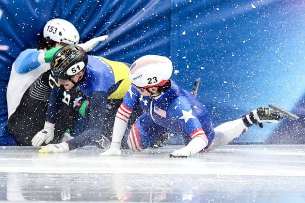 ITALY, MILAN - FEBRUARY 16, 2026: Brandon Kim of the US, Oleh Handei of Ukraine and Daniil Eybog (R-L) of Uzbekistan collide in the men s 500m short-track Speed skating, Eisschnelllauf heats during the 2026 Winter Olympic Games, Olympische Spiele, Olympia, OS at the Milano Ice Skating Arena. Peter Kovalev TASS  88801363