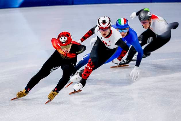 Xiaojun Lin of China and Felix Roussel of Canada Men s 5000m Relay Semifinals, Milano Cortina 2026 Winter Olympics: Day 10, Short Track Speed skating, Eisschnelllauf - Milano Cortina 2026 Winter Olympics: Day 10, Milano Speed Skating Stadium, February 16, 2026, Milan, Italy.