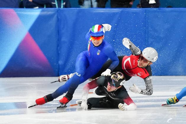 SIGHEL Pietro competing in the Olympic Short Track Speed skating, Eisschnelllauf Men s 500m Heats for the Milano Cortina 2026 Winter Olympics, in Milan (Italy) February 14, 2026 (Photo Claudio Furlan LaPresse)  Copyright: xClaudioxFurlan LaPressex