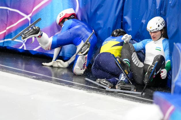 2026-02-16 - Milano Cortina 2026 Winter Olympics MILAN, ITALY - FEBRUARY 16: Brandon Kim of United States, Oleh Handei of Ukraine, Daniil Eibog of Uzbekistan performing on the Short Track Speed skating, Eisschnelllauf of the Milano Cortina 2026 Winter Olympics at the Milano Ice Skating Arena on February 16, 2026 in Milan, Italy Milan Milano Ice Skating Arena Italy Content not available for redistribution in The Netherlands directly or indirectly through any third parties. Copyright: xAndrexWeeningx