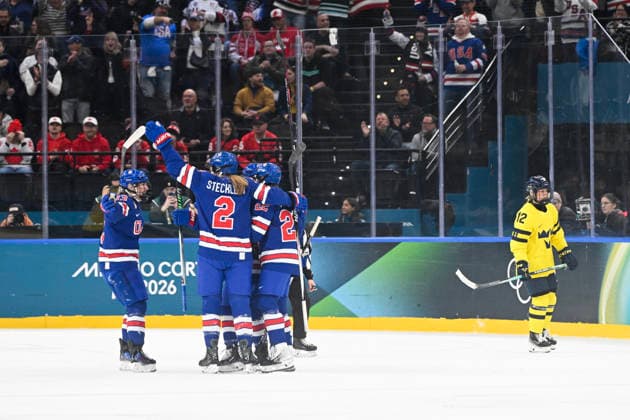 MILAN, ITALY 20260216 USA s Cayla Barnes 3 is hugged by her teammates after her goal, 1-0, during the women s semifinal between the USA and Sweden at the Santagiulia Arena during the Milan Olympics. *** The image is included in the SPORTS PACKAGE. For others PAID IMAGE *** MILANO ITALY x10070x *** MILAN, ITALY 20260216 USA s Cayla Barnes 3 is hugged by her teammates after her goal, 1 0, during the women s semifinal between the USA and Sweden at the Santagiulia Arena during the Milan Olympics The image is included in the SPORTS PACKAGE For others PAID IMAGE MILANO ITALY x10070x  Copyright: xJessicaxGow TTx OS 2026 ICE HOCKEY USA-SWEDEN SEMI-FINALS
