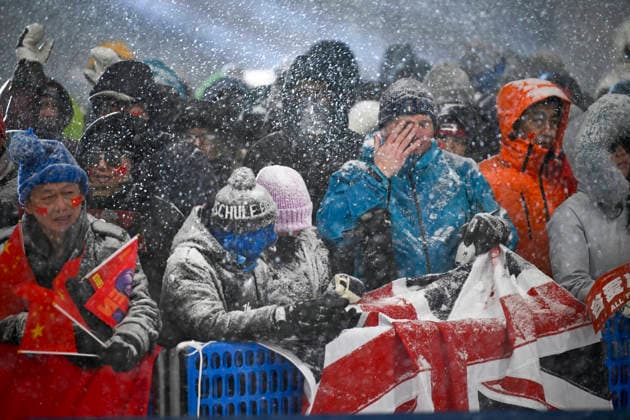 LKS 20260216 Snow falls on spectators during the Women s Freeski Big Air Final at the Milano Cortina Winter Olympics at Livigno Snow Park on February 16, 2026. - RONI REKOMAA Livigno Italy OLQ1cehs-0Q  Copyright: xRonixRekomaax OLQ1cehs-0Q