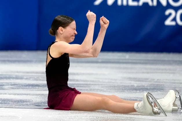 Ioulia Chtchetinina of Poland celebrates during the Pair Skating Free Skating Final at the Milano Figure skating, Eiskunstlauf Arena in Milan, Italy on Monday, February 16, 2026. Chtchetinina and Wozniak scored a 120.63 making their total score 185.86.  OLY20260216904 RICHARDxELLIS