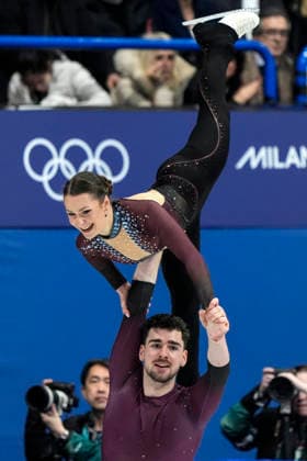 Annika Hocke and Robert Kunkel of Germany perform during the Pair Skating Free Skating Final at the Milano Figure skating, Eiskunstlauf Arena in Milan, Italy on Monday, February 16, 2026. Hocke and Kunkel scored a 126.59 making their total score 194.11.  OLY20260216929 RICHARDxELLIS