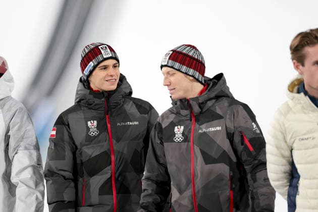 OLYMPICS - Winter Olympic Games, Olympische Spiele, Olympia, OS Milano Cortina 2026 PREDAZZO,ITALY,16.FEB.26 - OLYMPICS, Ski jumping, Skispringen, Ski, nordisch - Winter Olympic Games Milano Cortina 2026, large hill, Super Team, men, medal ceremony. Image shows Stephan Embacher and Jan Hoerl (AUT).  GEPAxpictures xMatthiasxTrinkl