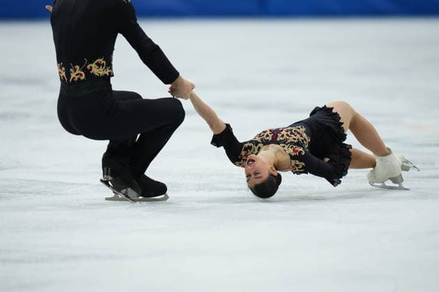 Italian s Rebecca Ghilardi Filippo Ambrosini compete during the pairs Figure skating, Eiskunstlauf short program at the 2026 Winter Olympics, at the Milano Cortina 2026 Winter Olympics, in Milan (Italy) February 16, 2026 (Photo Gian Mattia D Alberto LaPresse)  Copyright: xGianxMattiaxD Alberto LaPressex