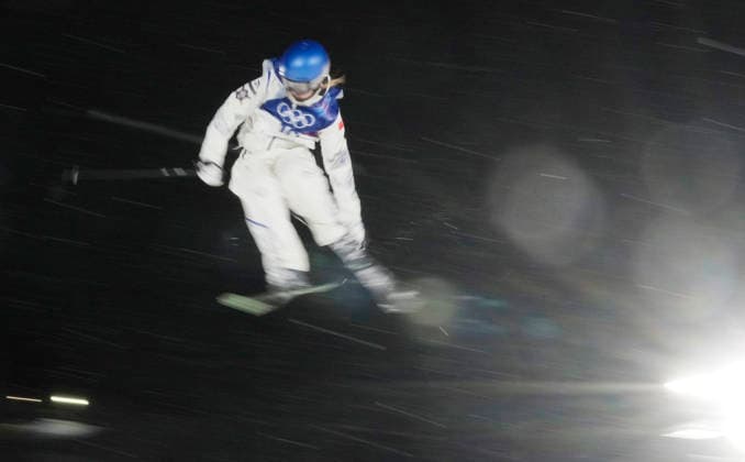 Eileen Gu of the People s Republic of China takes a practice jump during warmups for he Women s Freeski Big Air Final at the Milano Cortina 2026 Winter Olympic Games, Olympische Spiele, Olympia, OS in Livigno, Italy, on Monday, February 16, 2026.  OLY20260216820a BOBxSTRONG