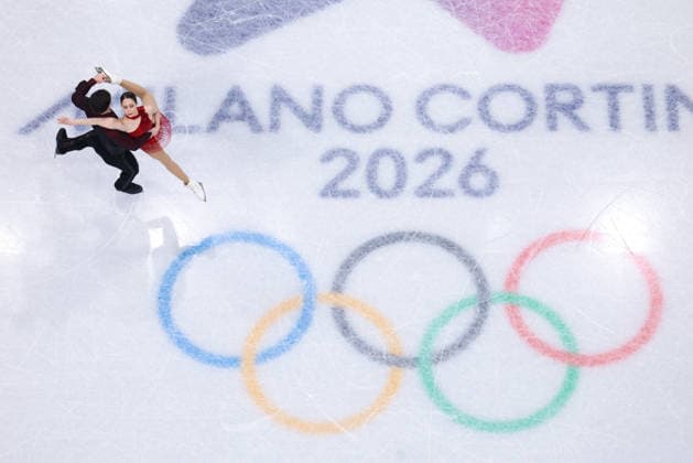 (260216) -- MILAN, Feb. 16, 2026 -- Deanna Stellato-Dudek (R) Maxime Deschamps of Canada compete during the Figure skating, Eiskunstlauf pair skating free skating match at the Milan-Cortina 2026 Olympic Winter games, Winterspiele,Spiele, Summer games in Milan, Italy, Feb. 15, 2026. ) (MICO2026)ITALY-MILAN-OLYMPIC WINTER GAMES-FIGURE SKATING-PAIR SKATING-FREE SKATING ChenxYichen 