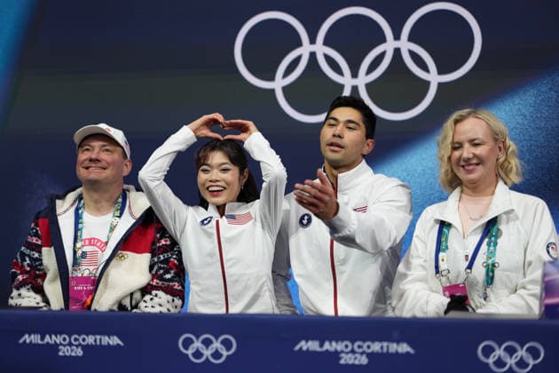 (260216) -- MILAN, Feb. 16, 2026 -- Emily Chan (2nd L) Spencer Akira Howe (2nd R) of the United States wait for their score during the Figure skating, Eiskunstlauf pair skating free skating match at the Milan-Cortina 2026 Olympic Winter games, Winterspiele,Spiele, Summer games in Milan, Italy, Feb. 15, 2026. ) (MICO2026)ITALY-MILAN-OLYMPIC WINTER GAMES-FIGURE SKATING-PAIR SKATING-FREE SKATING XuexYuge 