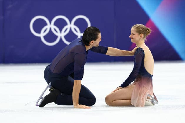 February 16, 2026, Milan, Lombardy, Italy: MINERVA FABIENNE HASE and NIKITA VOLODIN of Germany look slightly disappointed in their Free Skating in the Pair Skating of the Figure skating, Eiskunstlauf at the Milano Cortina 2026 Winter Olympic Games, Olympische Spiele, Olympia, OS Milan Italy - ZUMAc179 20260216_oly_c179_224 Copyright: xMickaelxChavetx