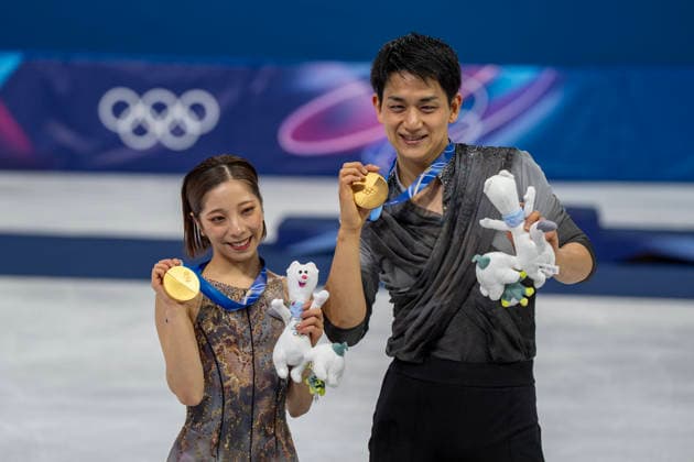February 16, 2026, Milan, Lombardy, Italy: Riku Miura (12-1) and Ryuichi Kihara (12-2) of Japan win the gold metal for the Figure skating, Eiskunstlauf Pair Skating Free Skating Finals at the Milano Ice Skating Arena during the 2026 Milano Cortina Winter Olympics in Milan, Italy. Olympics 2026: Milano Cortina: Figure Skating Pair Skating Free Skating Finals  - ZUMAa161 20260216_oly_a161_164 Copyright: xWalterxG.xArcex