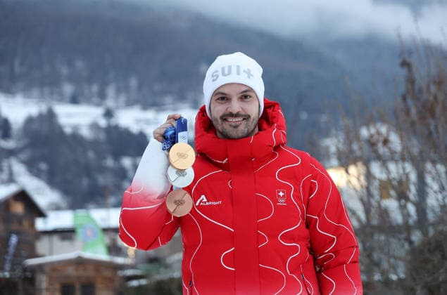 Winter Olympics - Loic Meillard Poses With Triple Olympic Medals Switzerland s Loic Meillard poses with his medals at the hotel of the Swiss team after winning the men s slalom alpine skiing event during the Milano Cortina 2026 Winter Olympic Games, Olympische Spiele, Olympia, OS at the Stelvio Ski Centre in Bormio, Italy on February 16, 2026. Photo by Sergio Bisi IPA ABACAPRESS.COM Bormio Italy  Copyright: xIPA ABACAx