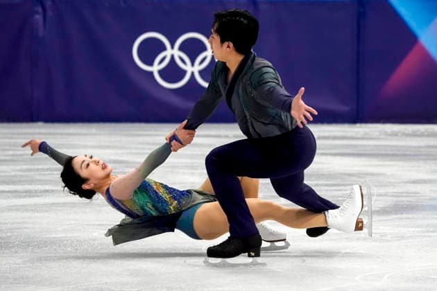 Wenjing Sui and Cong Han of China perform during the Pair Skating Free Skating Final at the Milano Figure skating, Eiskunstlauf Arena in Milan, Italy on Monday, February 16, 2026. Sui and Han scored a 135.98 making their total score 208.64.  OLY20260216950 RICHARDxELLIS
