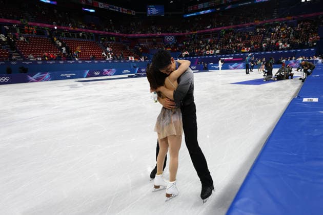 February 16, 2026, Milan, Lombardy, Italy: Japan skater KIHARA RYUICHI hugs his partner MIURA RIKU to celebrate winning the gold medal in the Pair Skating of the Figure skating, Eiskunstlauf at the Milano Cortina 2026 Winter Olympic Games, Olympische Spiele, Olympia, OS Milan Italy - ZUMAc179 20260216_oly_c179_254 Copyright: xMickaelxChavetx