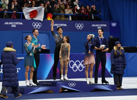 February 16, 2026, Milan, Lombardy, Italy: MIURA RIKU and KIHARA RYUICHI of Japan celebrate winning the gold medal in the Pair Skating of the Figure skating, Eiskunstlauf at the Milano Cortina 2026 Winter Olympic Games, Olympische Spiele, Olympia, OS Olympics 2026: Milano Cortina: Figure Skating Pairs  - ZUMAc179 20260216_oly_c179_285 Copyright: xMickaelxChavetx