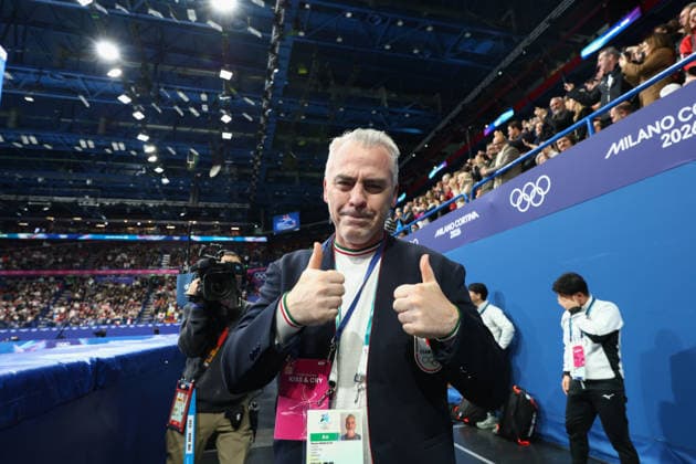 February 16, 2026, Milan, Lombardy, Italy: Coach BRUNO MARCOTTE of japanese pair MIURA RIKU and KIHARA RYUICHI of Japan celebrates after a mesmerizing performance in the Free Skating in the Pairs of the Figure skating, Eiskunstlauf at the Milano Cortina 2026 Winter Olympic Games, Olympische Spiele, Olympia, OS Olympics 2026: Milano Cortina: Figure Skating Pairs  - ZUMAc179 20260216_oly_c179_299 Copyright: xMickaelxChavetx