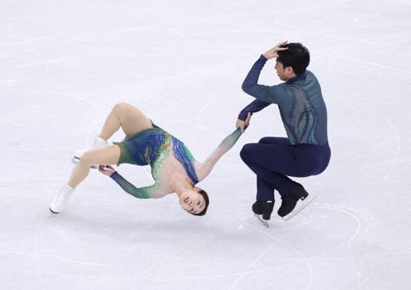 (260217) -- MILAN, Feb. 17, 2026 -- Sui Wenjing Han Cong of China compete during the free skating of Figure skating, Eiskunstlauf Pair Skating at the Milan-Cortina 2026 Olympic Winter games, Winterspiele,Spiele, Summer games in Milan, Italy, Feb. 16, 2026. ) (MICO2026)ITALY-MILAN-OLYMPIC WINTER GAMES-FIGURE SKATING-PAIRS-FREE SKATING ChenxYichen 