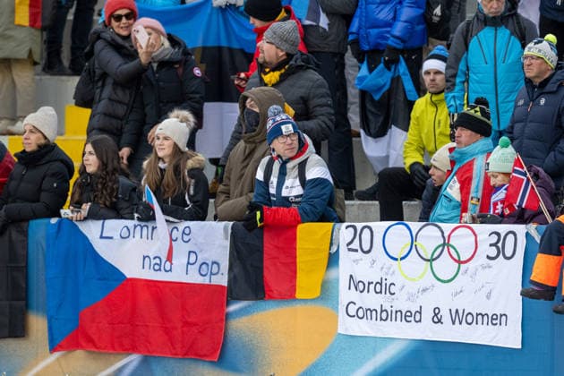 OLYMPICS - Winter Olympic Games, Olympische Spiele, Olympia, OS Milano Cortina 2026 PREDAZZO,ITALY,17.FEB.26 - OLYMPICS, NORDIC SKIING, NORDIC COMBINED, Ski jumping, Skispringen, Ski, nordisch - Winter Olympic Games Milano Cortina 2026, large hill. Image shows fans with banners.  GEPAxpictures xOliverxLerch