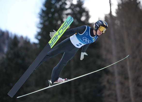 (260217) -- PREDAZZO, Feb. 17, 2026 -- Zhao Zihe of China competes during the Ski jumping, Skispringen, Ski, nordisch competition round of the Nordic Combined Individual Gundersen Large Hill 10km at the 2026 Milan-Cortina Winter Olympics in Predazzo, Italy, Feb. 17, 2026. ) (MICO2026)ITALY-PREDAZZO-OLYMPIC Winter games, Winterspiele,Spiele, Summer games NORDIC COMBINED-INDIVIDUAL GUNDERSEN LARGE HILL 10KM MengxYongmin 