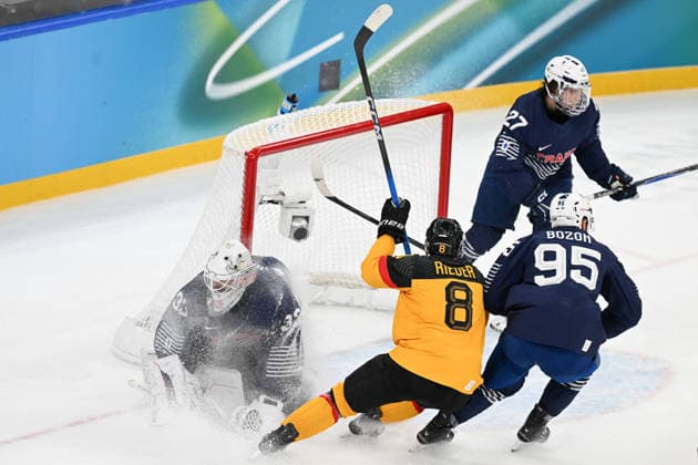 Winter Olympics - Ice hockey, Eishockey - Men - France v Germany Julian Junca (33) of Team France, Tobias Rieder (8) of Team Germany, Kevin Bozon (95) of Team France, Jules Boscq (27) of Team France during the men s qualification play-off ice hockey match between Germany and France at the Milano Santagiulia Ice Hockey Arena during the Milano Cortina 2026 Winter Olympic Games, Olympische Spiele, Olympia, OS in Milan, on February 17, 2026. Photo by JMP ABACAPRESS.COM Milan Italy  Copyright: xJMP ABACAx