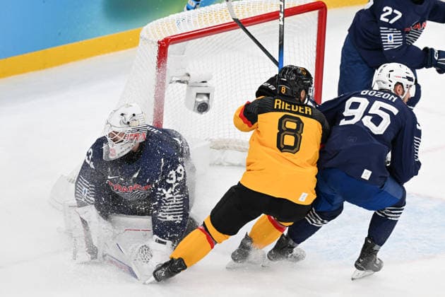 Winter Olympics - Ice hockey, Eishockey - Men - France v Germany Julian Junca (33) of Team France, Tobias Rieder (8) of Team Germany, Kevin Bozon (95) of Team France, Jules Boscq (27) of Team France during the men s qualification play-off ice hockey match between Germany and France at the Milano Santagiulia Ice Hockey Arena during the Milano Cortina 2026 Winter Olympic Games, Olympische Spiele, Olympia, OS in Milan, on February 17, 2026. Photo by JMP ABACAPRESS.COM Milan Italy  Copyright: xJMP ABACAx