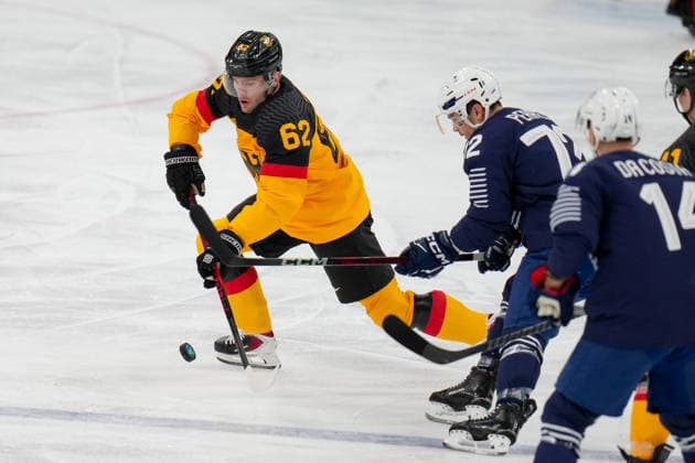 Parker Tuomie (Germany) udn Jordann Perret (France) battle for the puck during the Ice hockey, Eishockey Men - Qualification Play-off match between Germany v France on day eleven of the Milano Cortina 2026 Winter Olympic Games, Olympische Spiele, Olympia, OS at Milano Santagiulia IHO Ice Hockey Arena on February 17, 2026 in Milan, Italy. (Photo by Alex Gottschalk DeFodi Images) - *** Parker Tuomie Germany and Jordann Perret France battle for the puck during the Ice Hockey Men Qualification Play off match between Germany v France on day eleven of the Milano Cortina 2026 Winter Olympic games at Milano Santagiulia IHO Ice Hockey Arena on February 17, 2026 in Milan, Italy Photo by Alex Gottschalk DeFodi Images