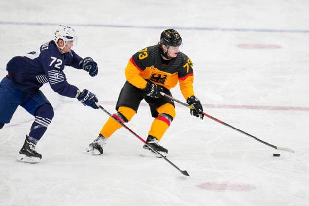 Jordann Perret (France) und Lukas Reichel (Germany) battle for the puck during the Ice hockey, Eishockey Men - Qualification Play-off match between Germany v France on day eleven of the Milano Cortina 2026 Winter Olympic Games, Olympische Spiele, Olympia, OS at Milano Santagiulia IHO Ice Hockey Arena on February 17, 2026 in Milan, Italy. (Photo by Alex Gottschalk DeFodi Images) - *** Jordann Perret France and Lukas Reichel Germany battle for the puck during the Ice Hockey Men Qualification Play off match between Germany v France on day eleven of the Milano Cortina 2026 Winter Olympic games at Milano Santagiulia IHO Ice Hockey Arena on February 17, 2026 in Milan, Italy Photo by Alex Gottschalk DeFodi Images