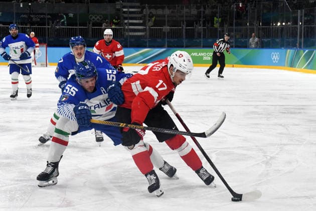 GIOCHI OLIMPICI - Olimpiadi Invernali Milano-Cortina 2026 - Ice hockey, Eishockey Ken Jager (Suisse) against Luca Zanatta (Italy) during Ice Hockey, Olympic Winter games, Winterspiele,Spiele, Summer games Milano-Cortina 2026 in Milano, Italy, February 17 2026 Cortina D Ampezzo Italy  Copyright: xIPAxSport ABACAx