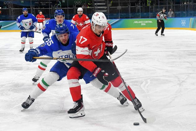 GIOCHI OLIMPICI - Olimpiadi Invernali Milano-Cortina 2026 - Ice hockey, Eishockey Ken Jager (Suisse) against Luca Zanatta (Italy) during Ice Hockey, Olympic Winter games, Winterspiele,Spiele, Summer games Milano-Cortina 2026 in Milano, Italy, February 17 2026 Cortina D Ampezzo Italy  Copyright: xIPAxSport ABACAx