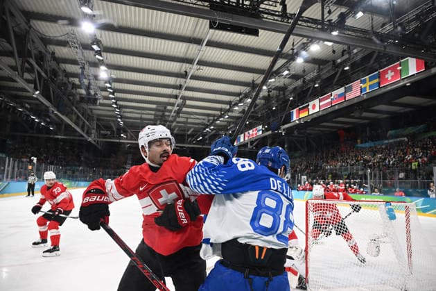Jonas Siegenthaler (SUI),Tommaso De Luca (ITA) during the Winter Olympic Games, Olympische Spiele, Olympia, OS Milano Cortina 2026, at the Milano Rho Ice hockey, Eishockey Arena, on February 17, 2026 in Milano, Italy  Copyright: xFedericoxManoni IPAxSportx xipa-agency.netx xx IPA_71639252 IPA_Agency_IPA71639252
