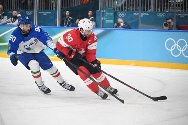 GIOCHI OLIMPICI - Olimpiadi Invernali Milano-Cortina 2026 - Ice hockey, Eishockey Dylan Di Perna (ITA),Roman Josi (SUI) during the Winter Olympic Games, Olympische Spiele, Olympia, OS Milano Cortina 2026, at the Milano Rho Ice Hockey Arena, on February 17, 2026 in Milano, Italy Cortina D Ampezzo Italy  Copyright: xIPAxSport ABACAx
