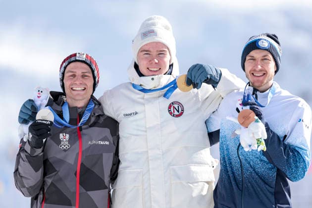 OLYMPICS - Winter Olympic Games, Olympische Spiele, Olympia, OS Milano Cortina 2026 TESERO,ITALY,17.FEB.26 - OLYMPICS, NORDIC SKIING, NORDIC COMBINED, CROSS COUNTRY - Winter Olympic Games Milano Cortina 2026, 10km Gundersen, medal ceremony. Image shows the rejoicing of Johannes Lamparter (AUT), Jens Luraas Oftebro (NOR) and Ikka Herola (FIN). Keywords: medal.  GEPAxpictures xMatthiasxTrinkl