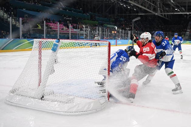 BERTSCHY Christoph (SUI) fight against CLARA Damian (ITA) during Ice hockey, Eishockey Olympic Winter games, Winterspiele,Spiele, Summer games Milano-Cortina 2026 in Milano, Italy, February 17 2026  Copyright: xFilippoxTomasi IPAxSportx xipa-agency.netx xx IPA_71642534 IPA_Agency_IPA71642534