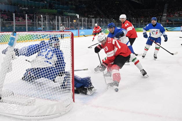 GIOCHI OLIMPICI - Olimpiadi Invernali Milano-Cortina 2026 - Ice hockey, Eishockey SCHMID Sandro (SUI) hit in front of the italian goal during Ice Hockey, Olympic Winter games, Winterspiele,Spiele, Summer games Milano-Cortina 2026 in Milano, Italy, February 17 2026 Cortina D Ampezzo Italy  Copyright: xIPAxSport ABACAx
