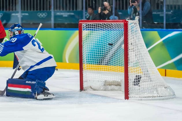 February 17, 2026, Milan, Lombardy, Italy: Team Switzerland scores a goal against Team Italy in the qualification play off game at the Milano Rho Ice hockey, Eishockey Arena in MILAN, Italy during the 2026 Milano Cortina Winter Olympics. Team Switzerland defeats Italy 3:0 and heads to the quarterfinals against Team Finland. Milan Italy - ZUMAa161 20260217_oly_a161_134 Copyright: xWalterxG.xArcex