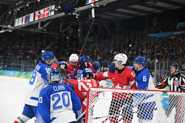 Ice hockey, Eishockey Man s , Switzerland- Italy, Milano Cortina 2026 Winter Olympics Game : Day 11 Italian and Swiss players fight during the Winter Olympic Games, Olympische Spiele, Olympia, OS in Milano, Italy, on February 17, 2026, at the Milano Rho Ice Hockey Arena Milano Lombardia Italy  Copyright: xFedericoxManonix originalFilename:manoni-notitle260217_npOHZ.jpg