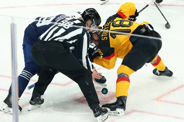 February 17, 2026, Milan, Lombardy, Italy: Face-off during the Play-off game between Team Germany and Team France at the Milano Cortina 2026 Olympic Games, Olympische Spiele, Olympia, OS Olympics 2026: Milano Cortina: Ice hockey, Eishockey Men: GER:FRA  - ZUMAc179 20260217_oly_c179_061 Copyright: xMickaelxChavetx