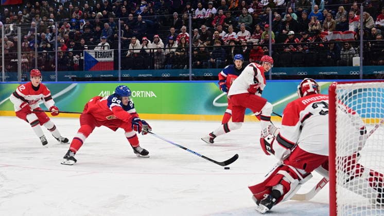 XXV Winter Olympic Games, Olympische Spiele, Olympia, OS in Milan, Italy, on February 17, 2026. Men s Ice hockey, Eishockey preliminary round playoffs, Czechia - Denmark. L-R David Kampf (CZE) and goalkeeper Frederik Andersen (DEN). (CTKxPhoto MichalxKamaryt) CTKPhotoP2026021706303  CTKPhotoP2026021706303