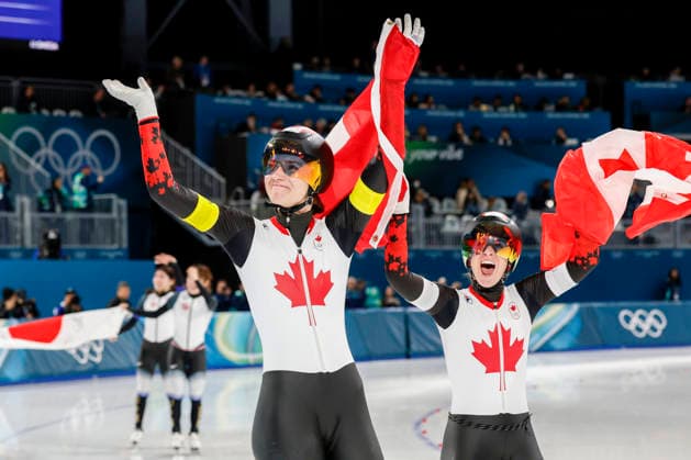 Isabelle Weidemann and Ivanie Blondin of Team Canada skate around the track after winning gold during the Women s Speed skating, Eisschnelllauf Team Pursuit Finals at the Milano Speed Skating Stadium in Milan, Italy on Tuesday, February 17, 2026. The Netherlands won silver and Japan won bronze.  OLY20260217959 AARONxJOSEFCZYK