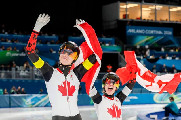 Isabelle Weidemann and Ivanie Blondin of Team Canada skate around the track after winning gold during the Women s Speed skating, Eisschnelllauf Team Pursuit Finals at the Milano Speed Skating Stadium in Milan, Italy on Tuesday, February 17, 2026. The Netherlands won silver and Japan won bronze.  OLY20260217960 AARONxJOSEFCZYK