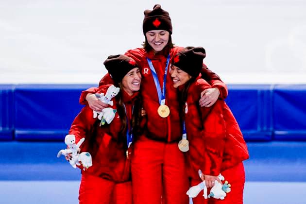 winner team of Canada, Ivanie Blondin of Canada and Valerie Maltais of Canada and Isabelle Weidemann of Canada smiling during the medal ceremony after Women s Team Pursuit Finals, Milano Cortina 2026 Winter Olympics: Day 11, Speed skating, Eisschnelllauf - Milano Cortina 2026 Winter Olympics: Day 11, Milano Speed Skating Stadium, February 17, 2026, Milan, Italy.