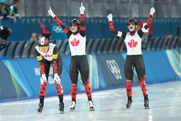 February 17, 2026, Milan, ITALY: Canada s Ivanie Blondin, white armband, Valerie Maltais, red armband, Isabelle Weidemann, yellow armband, react after winning the gold medal final of the women s team pursuit speedskating race at the 2026 Winter Olympics, in Milan, Italy, Tuesday, Feb. 17, 2026. Canada News - February 17, 2026  - ZUMAc35_ 20260217_zaf_c35_027 Copyright: xNathanxDenettex