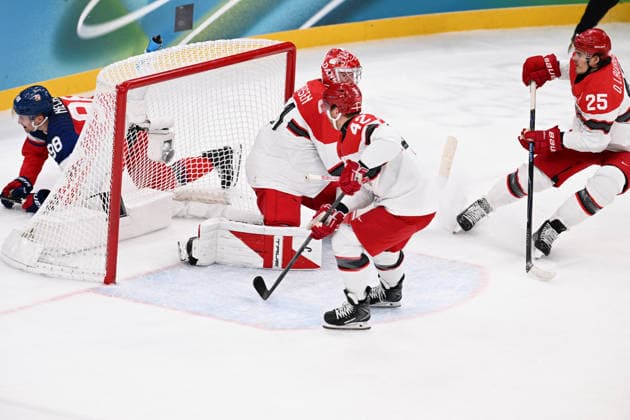 Winter Olympics - Ice hockey, Eishockey Men Czechia vs Denmark - Qualification Play-off Oliver Lauridsen (25) of Denmark and Phillip Bruggisser (42) of Denmark during Ice Hockey Men Czechia vs Denmark - Qualification Play-off on day eleven of the Milano Cortina 2026 Winter Olympic Games, Olympische Spiele, Olympia, OS on February 17, 2026 in Milan, Italy. Photo by JMP ABACAPRESS.COM Milan Italy  Copyright: xJMP ABACAx