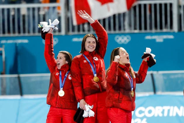 Invanie Blondin, Isabelle Wiedemann and Valerie Maltais celebrate of Team Canada after receiving their gold medals during the medal ceremony after the Women s Speed skating, Eisschnelllauf Team Pursuit Finals at the Milano Speed Skating Stadium in Milan, Italy on Tuesday, February 17, 2026. Canada won gold, the Netherlands won silver and Japan won bronze.  OLY20260217968 AARONxJOSEFCZYK